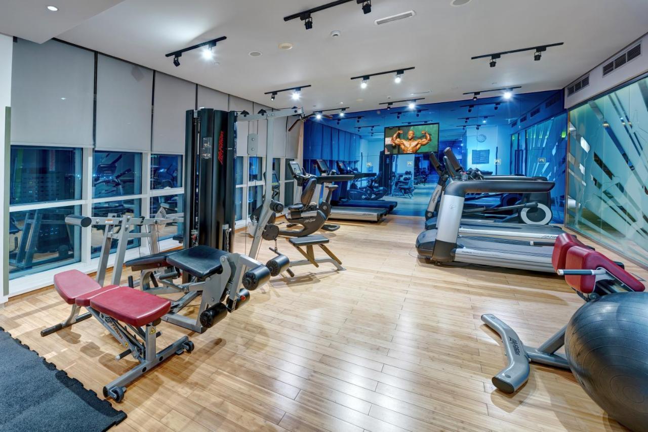 فندق إيه سي تي الشارقة المظهر الخارجي الصورة The gym at the hotel