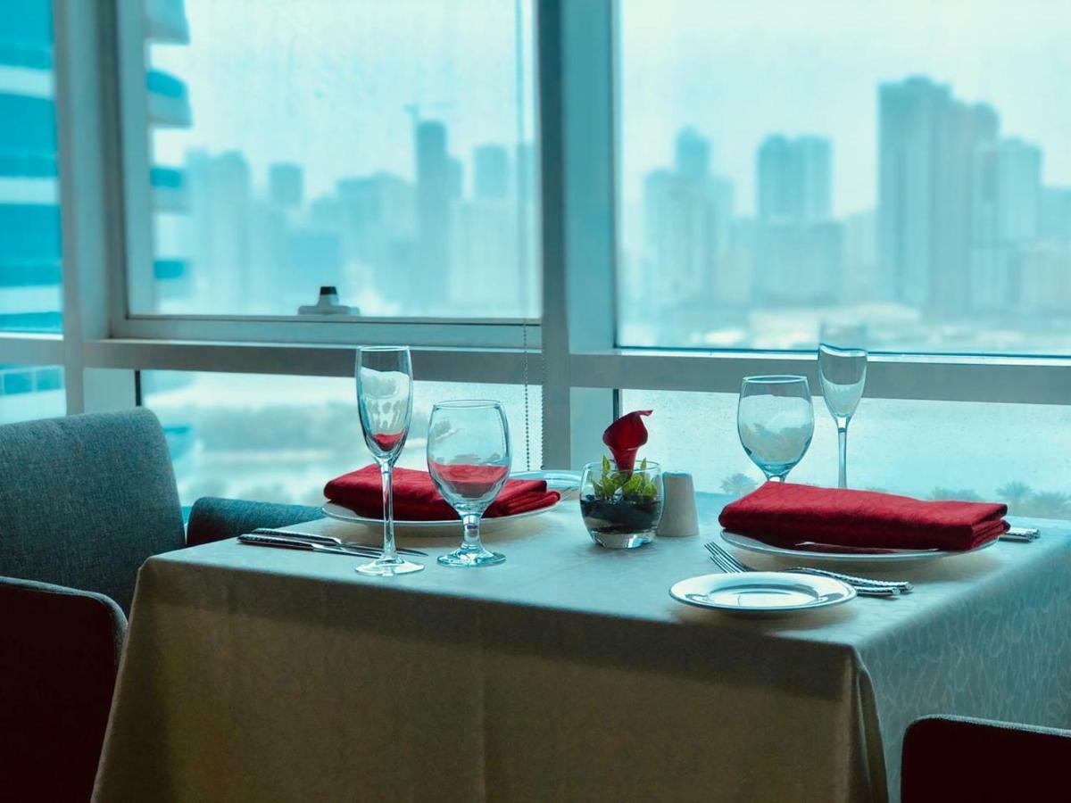 فندق إيه سي تي الشارقة المظهر الخارجي الصورة A table set for dinner