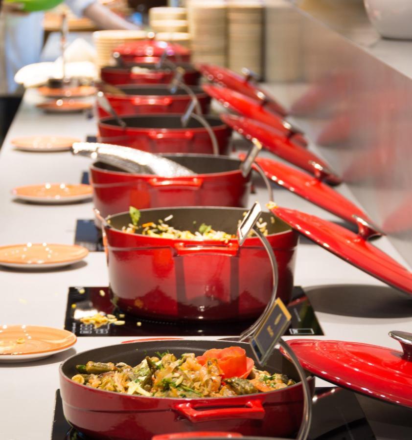 فندق إيه سي تي الشارقة المظهر الخارجي الصورة Le Creuset cookware